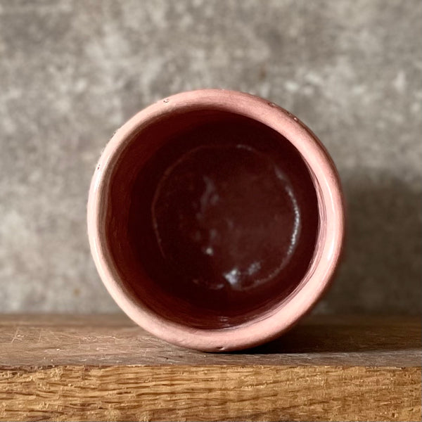 Pink mug with words in Lithuanian