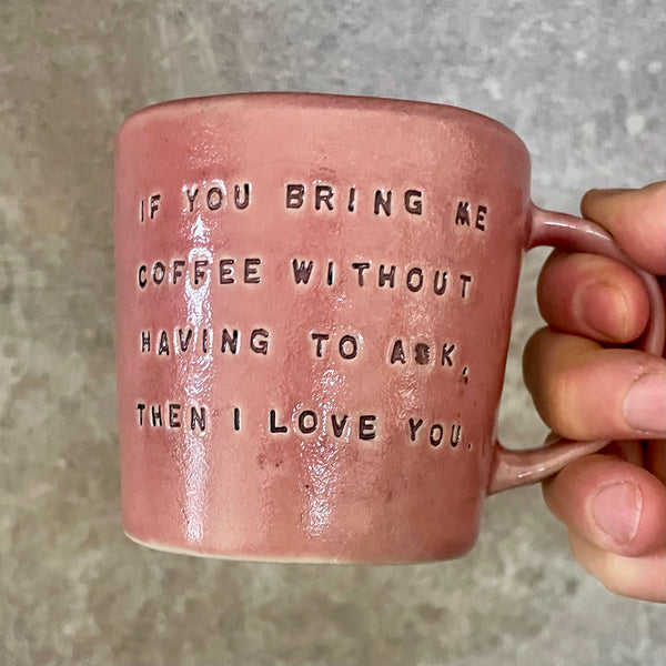 Red mug with funny coffee saying