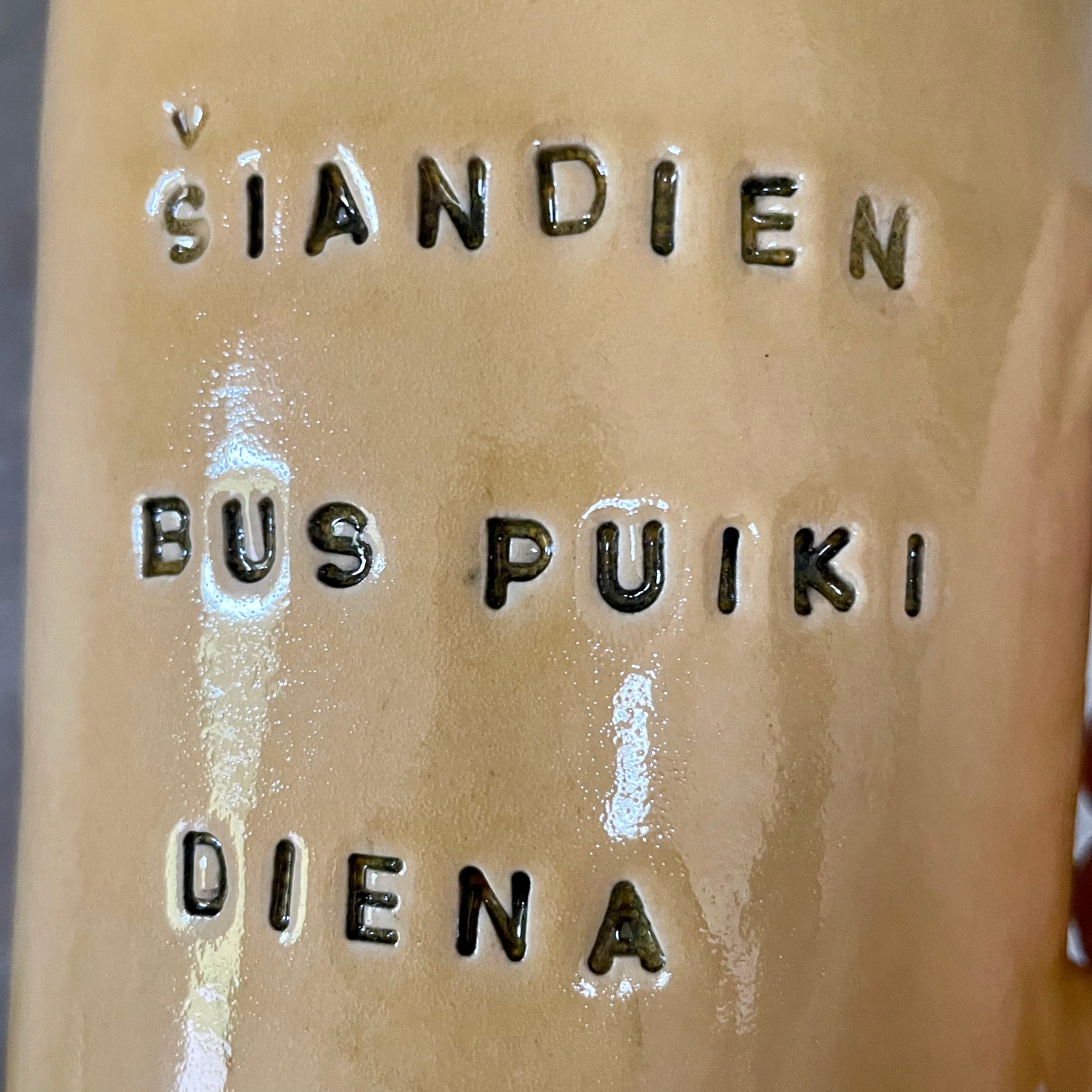 Ultra large yellow mug with text in Lithuanian