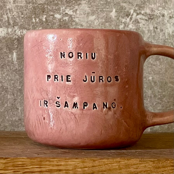 Pink mug with sweet words in Lithuanian