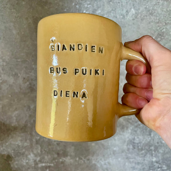 Ultra large yellow mug with text in Lithuanian