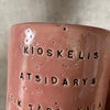 Pink mug with words in Lithuanian