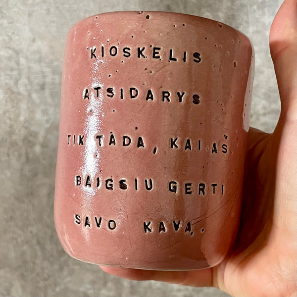 Pink mug with words in Lithuanian