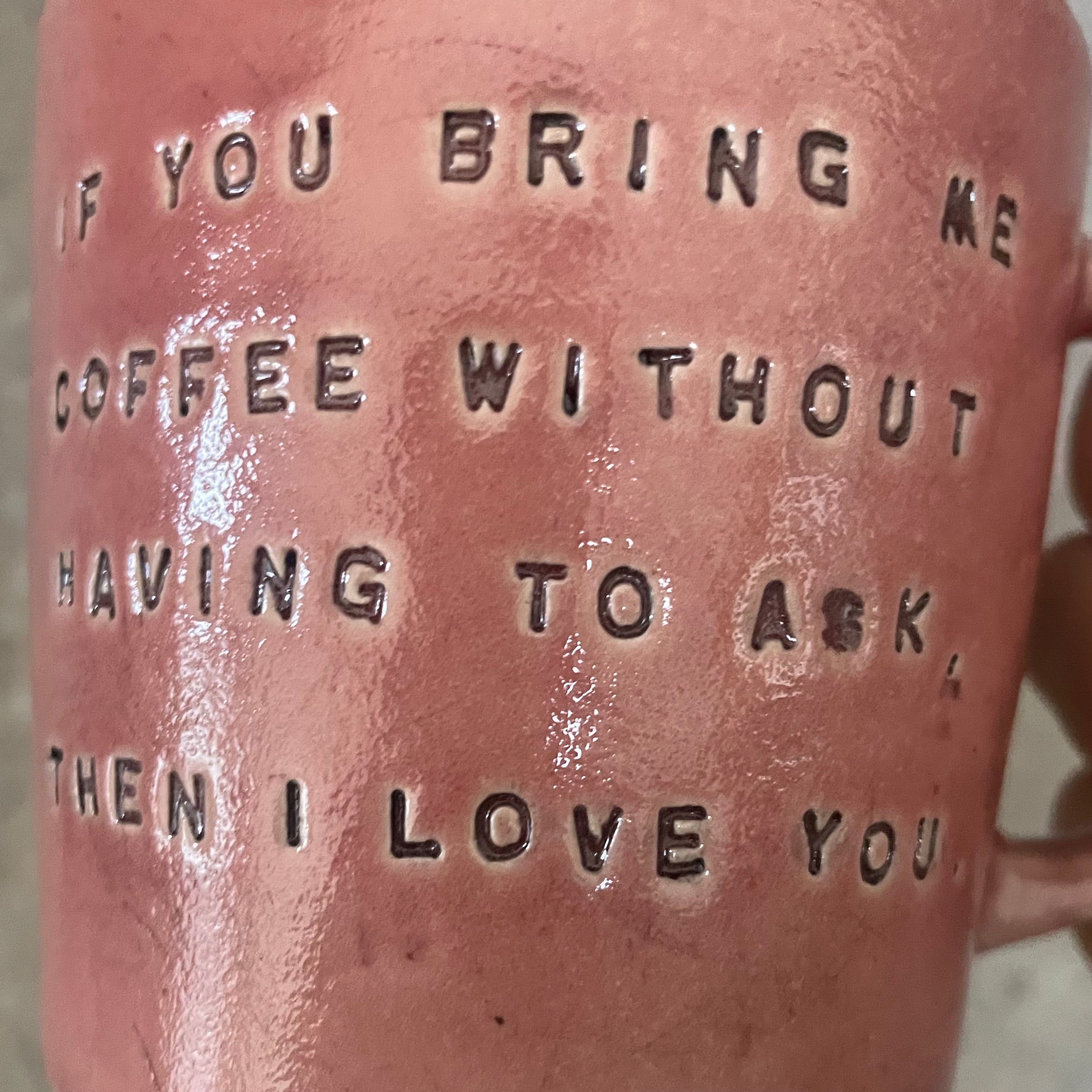 Red mug with funny coffee saying